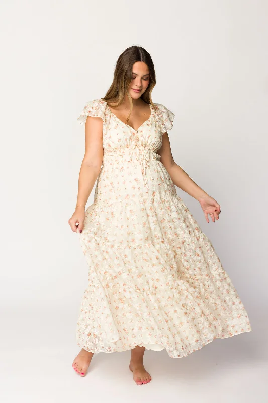 Midi dresses with geometric cutouts for a contemporary and edgy look Charming Floral & Gingham Ruffled Maxi Dress in Cream/Peach Floral Midi dresses with geometric cutouts for a contemporary and edgy look Charming Floral & Gingham Ruffled Maxi Dress in Cream/Peach Floral