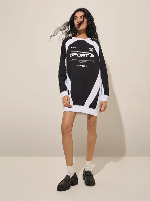 Mini dresses with tiered skirts for added volume Nuon Black Text Printed Cotton-Blend Straight Dress