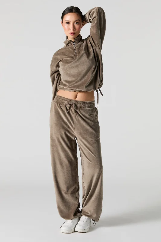 Women's graphic - printed sweatshirt featuring floral patterns for a feminine touchVelour Toggle Hem Sweatpant Women's graphic - printed sweatshirt featuring floral patterns for a feminine touchVelour Toggle Hem Sweatpant