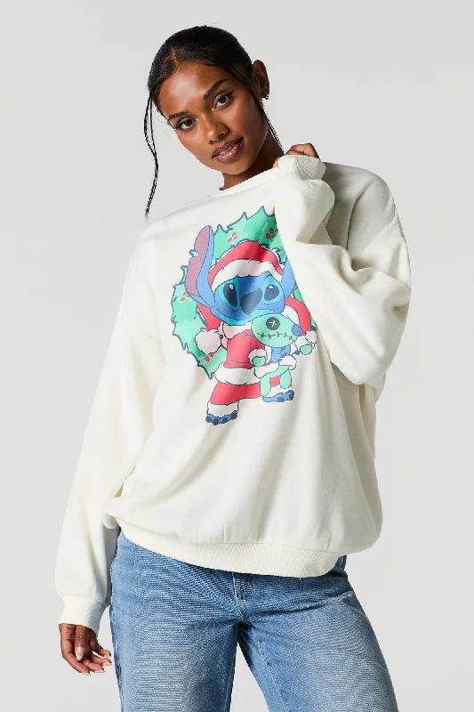 Women's zip - up sweatshirt in pastel blue for a soft and stylish outfitSanta Stitch Graphic Fleece Christmas Sweatshirt Women's zip - up sweatshirt in pastel blue for a soft and stylish outfitSanta Stitch Graphic Fleece Christmas Sweatshirt