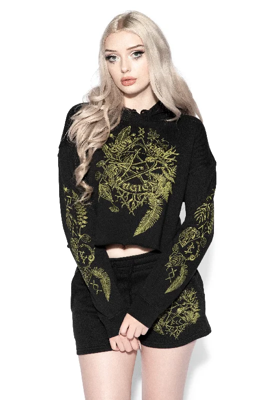 Women's pullover hoodie with a side slit for a modern and relaxed fitGrow Your Own Magic - Women's Cropped Hoodie