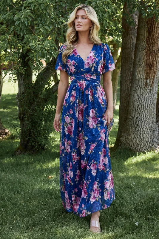Ruffled maxi dresses with a tiered skirt for added volumeArdley Maxi Dress | Navy + Pink Floral Ruffled maxi dresses with a tiered skirt for added volumeArdley Maxi Dress | Navy + Pink Floral