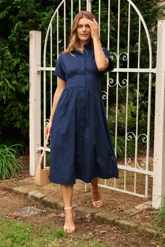Midi dresses with bow accents for a sweet and charming lookCielo Midi Dress In Navy Cotton Midi dresses with bow accents for a sweet and charming lookCielo Midi Dress In Navy Cotton