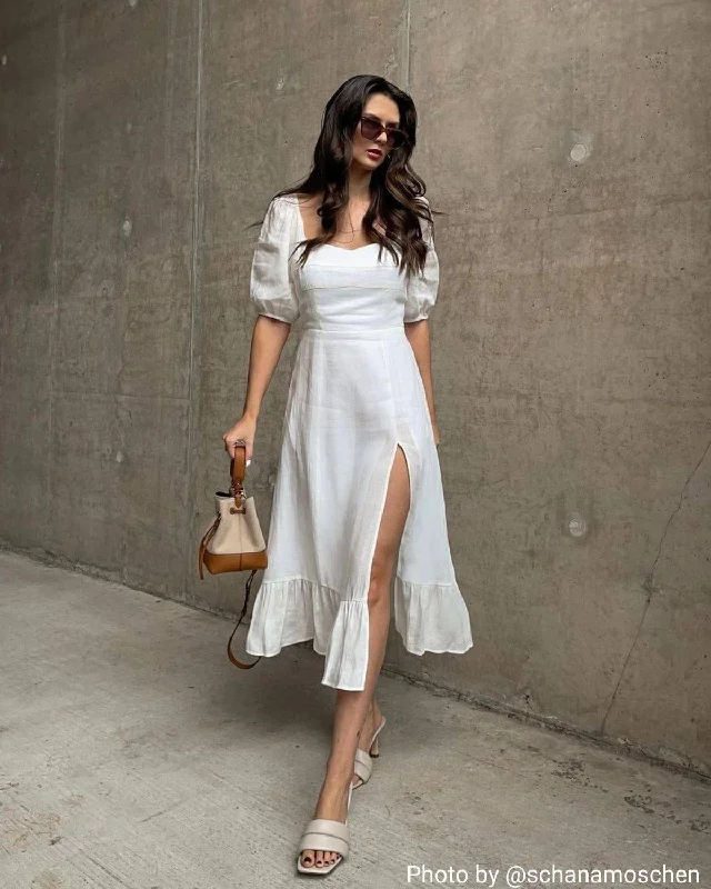 Midi dresses with keyhole backs for a flirty and unexpected detailPuff Sleeve Split Hem Midi Dress Midi dresses with keyhole backs for a flirty and unexpected detailPuff Sleeve Split Hem Midi Dress