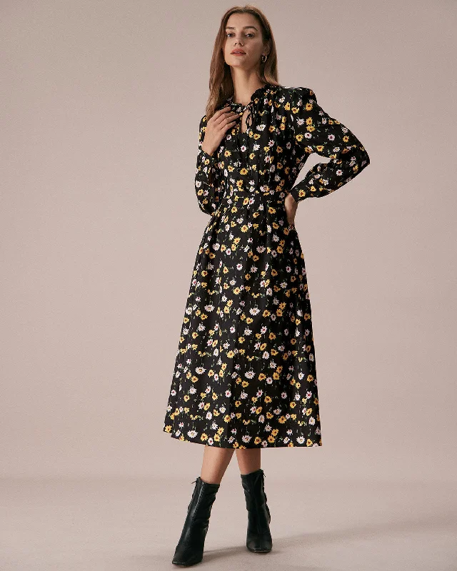 Midi dresses with gathered skirts for a full and flowing silhouetteThe Black Tie Neck Floral Ruched Midi Dress Midi dresses with gathered skirts for a full and flowing silhouetteThe Black Tie Neck Floral Ruched Midi Dress