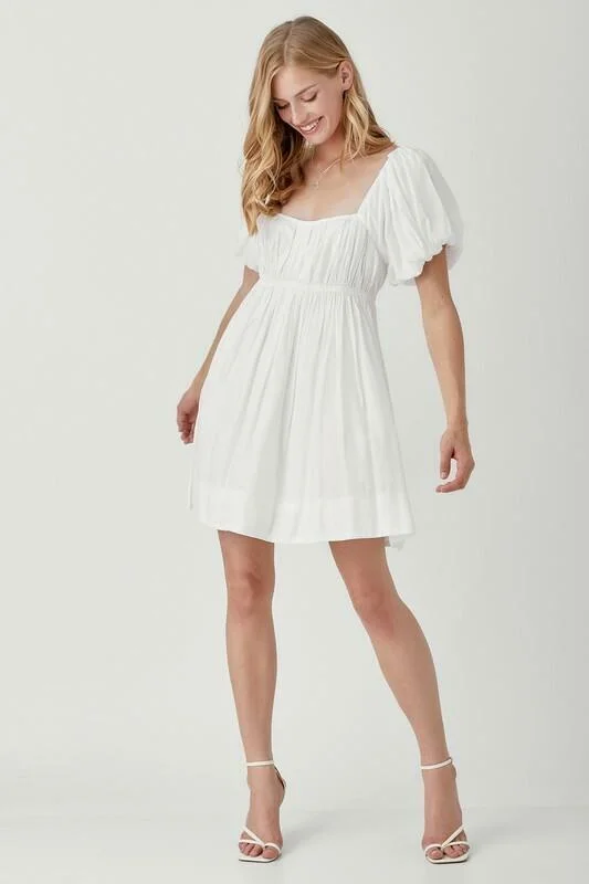 Wedding guest dresses with keyhole backs and flowing fabricsChloe White Puff Sleeve Mini Dress