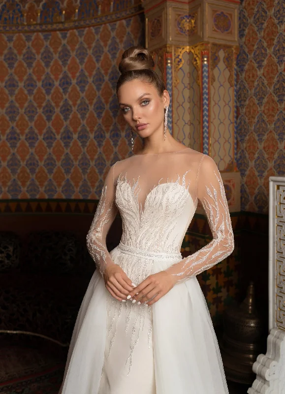 Sheer wedding guest dresses with lace inserts and long sleevesSheer Long Sleeve Mermaid Wedding Dress with Overskirt